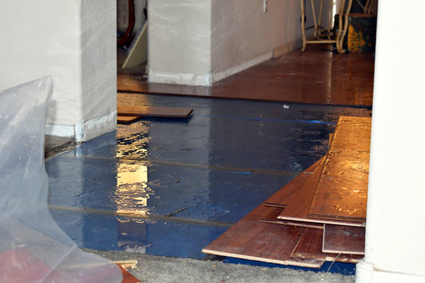 Professional Flood Damage Restoration technician working in South Dos Palos, CA